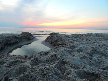 Scenic view of sea against sky during sunset