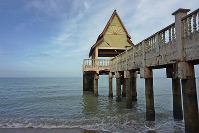 Pier over sea against sky