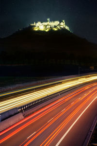 Light trails on road at night