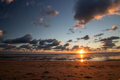 Atlantic ocean sunset with pink and purple sky, montalivet france