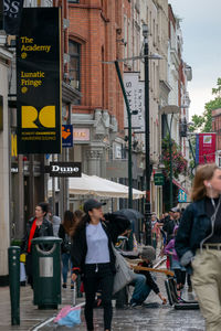 People walking on city street