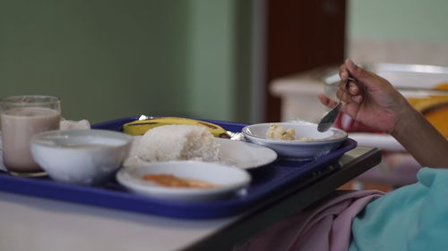 Midsection of person preparing food