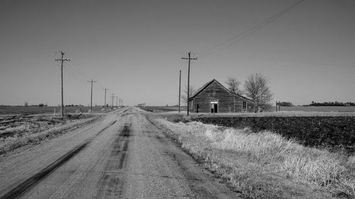 View of country road against clear sky