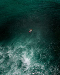 High angle view of person swimming in sea. bird of eye