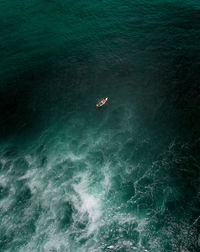 High angle view of person swimming in sea