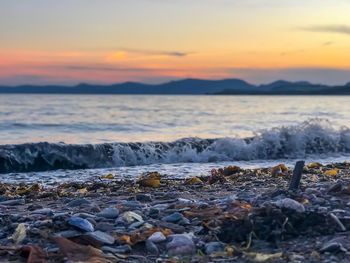 Scenic view of sea against sky during sunset