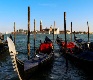 Boats moored in sea