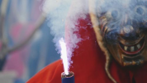 Close-up of red light against blurred background