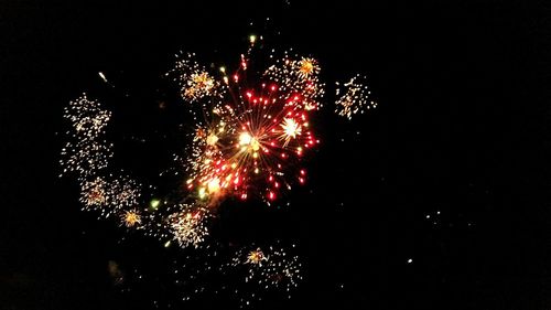 Firework display at night