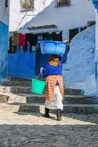 Chefchaouen, the blue diamond. working woman