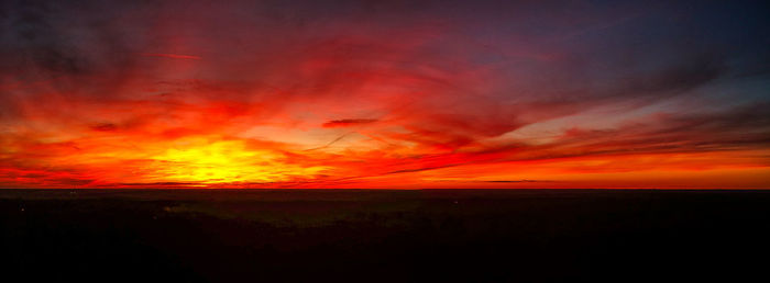 Scenic view of dramatic sky during sunset