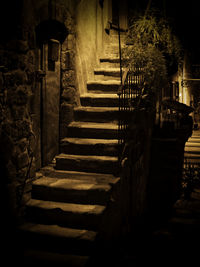 Staircase in old building at night