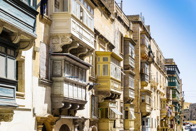 Low angle view of residential building against sky