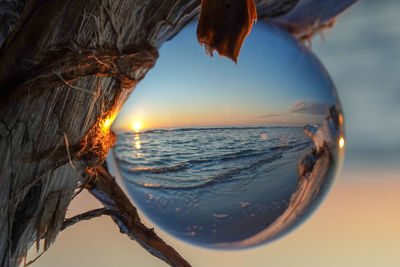 Close-up of sea during sunset