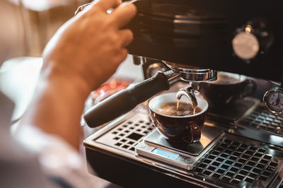 Man holding coffee cup