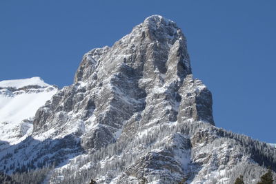 Low angle view of mountain against clear sky