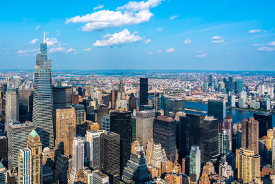 Aerial view of cityscape against sky