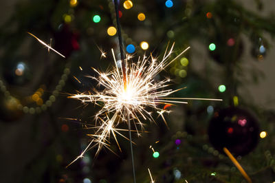 Close-up of firework display at night