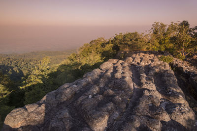 Rock formations on landscape against sky