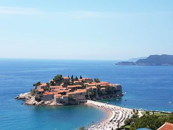 High angle view of sea against blue sky