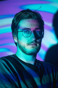 Portrait of man wearing eyeglasses