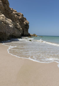 Wild beach at the coat of ras al jinz, sultanate of oman. a travel destination