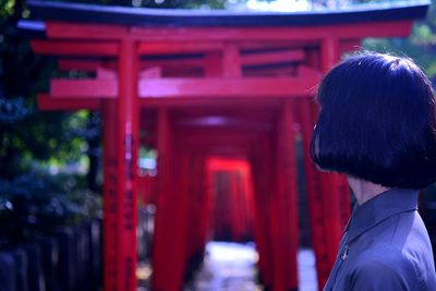 Rear view of woman outside temple