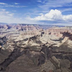 Aerial view of dramatic landscape against sky