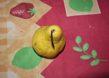 High angle view of apple on table