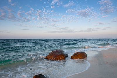 Scenic view of sea against sky during sunset