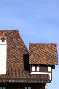 Exterior of old building against blue sky