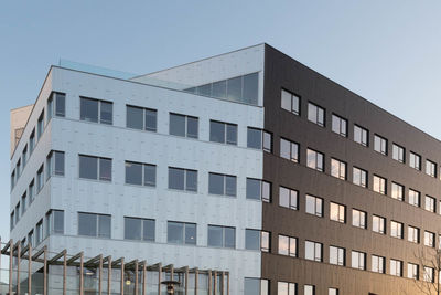 Apartment building against clear sky