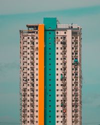 Low angle view of skyscraper against sky