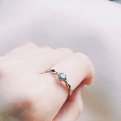 Cropped image of woman hand wearing diamond ring