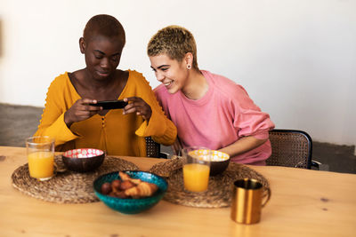 Side view of senior man preparing food at home