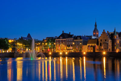 Houses along hofvijver lake in the hague, netherlands