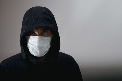 Portrait of man against white background