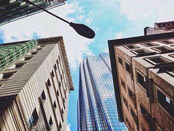 Low angle view of modern buildings against sky