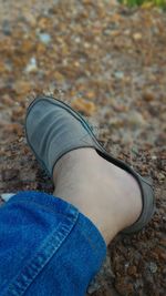 Low section of man standing outdoors