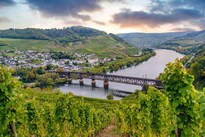 Scenic view of bridge over river against sky