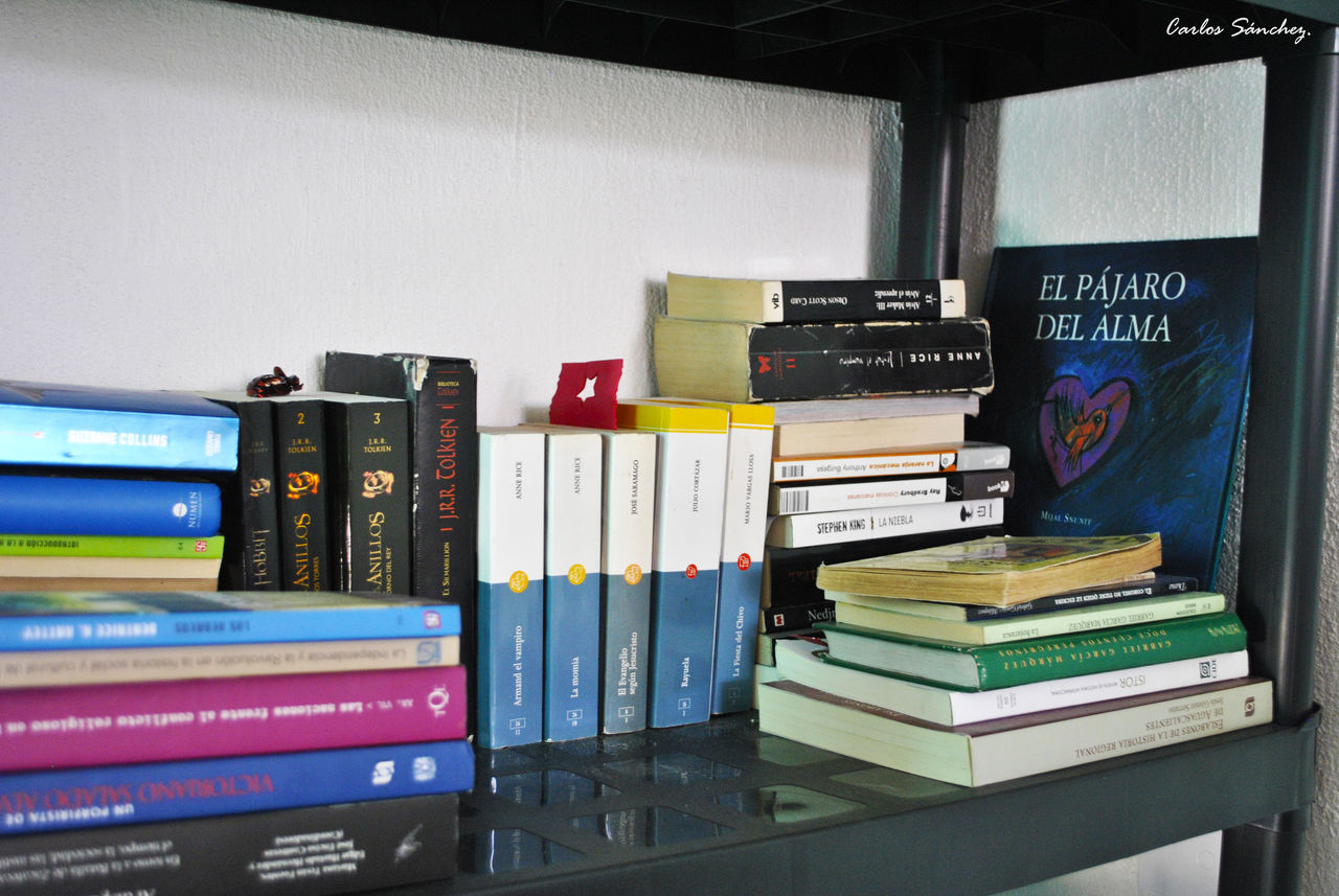 book, indoors, education, large group of objects, stack, learning, shelf, no people, knowledge, home interior, bookshelf, day, close-up