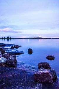 Scenic view of sea against cloudy sky