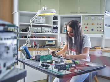 Woman working on table