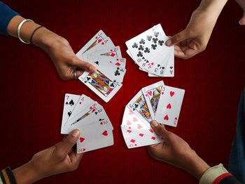 Cropped hands of woman holding gift