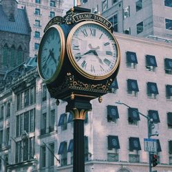 Low angle view of clock on building