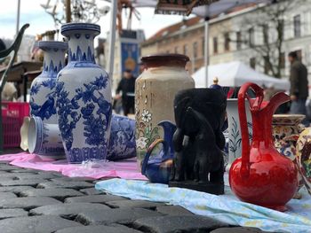 Close-up of various vase at market for sale