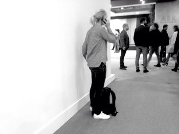 People standing in corridor