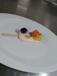 High angle view of cake served in plate on table