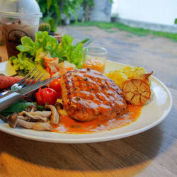 Close-up of meal served in plate on table