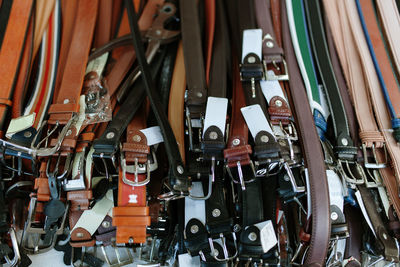 High angle view of leather belts 